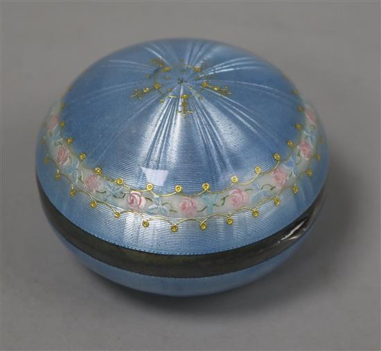 An early 20th century continental silver and blue guilloche enamel circular powder box, with hinged lid